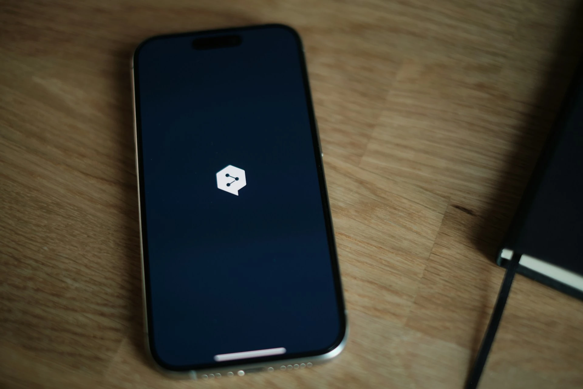 Smartphone screen displaying the DeepL logo.